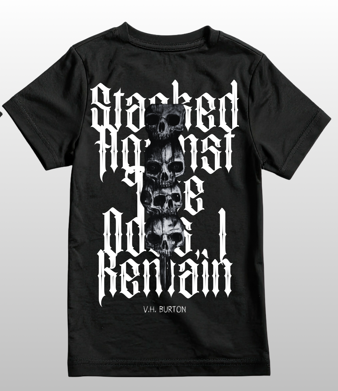Black t-shirt with white text and skull design on a gray background